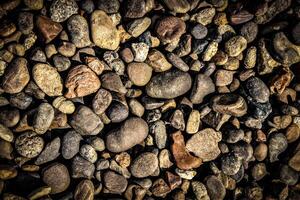 the texture of small stone pebbles photo