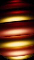 A bright two-tone ball.Design. An abstraction on which a black background and a ball of two colors with shadows slowly revolves around itself in 3d. video