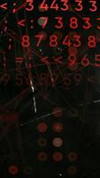 Programming on a black background with red illumination. Motion. Dark background in animation with appearing lines with numbers. video
