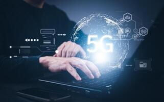 Global network connection 5G on hand business man.Global network connection 5G with icon concept, technology network wireless systems and internet of things, new technologies coming up in the future. photo