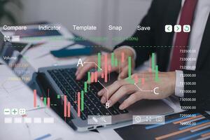 Businessman interacting with magnifying glass with featuring stock tickers or graphs, cryptocurrency and new trading platforms, ideas and perspectives, Stock investment,New technology photo