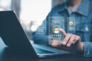 businessman using laptop with Personal information file storage concept ,HR checklists of employees Corporate data management system and document management system with employee privacy. photo