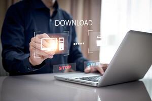 The man is using a computer under the concept of technology, downloading, uploading, and database management.digital communication technology for online ,Cloud Computing Concept photo