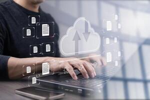 Cloud technology concept Global network of metaverse systems concept, Man hand touch data with internet cloud technology and File Transfer backup copy,Global business Internet for Telecommunication photo