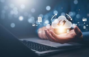 Cloud technology concept Global network of metaverse systems concept, Man hand touch data with internet cloud technology and File Transfer backup copy,Global business Internet for Telecommunication photo