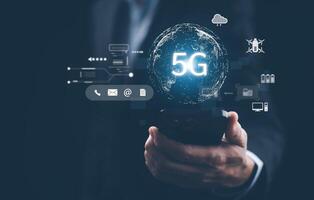 Global network connection 5G on hand business man.Global network connection 5G with icon concept, technology network wireless systems and internet of things, new technologies coming up in the future. photo