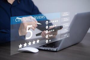 Man touch smartphone with Customer review satisfaction feedback survey concept, User give rating to service experience on online application, service leading to reputation ranking of business. photo