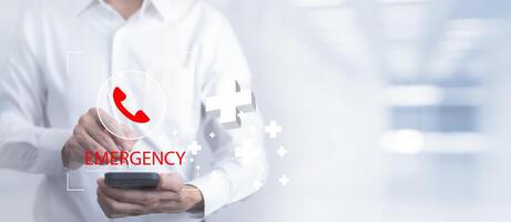 Hand touch button Emergency app in home, call phone, Chat message icon, Emergency application from smartphone for elderly, technology concept.Old hand touch mobile phone and call for help. photo