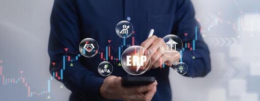 Business people using a laptop with document management for ERP. Enterprise resource planning concept,Enterprise Resource Management ERP software system for business resources plan presented. photo
