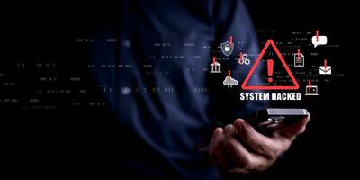 programmer using laptop with triangle caution warning sign for notification error system , hacker attacks and hacking data, cyber crime, cyber security photo