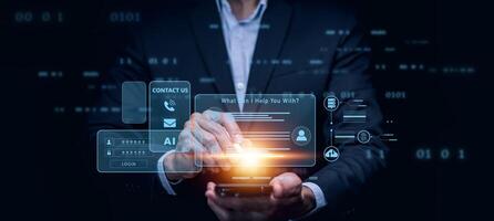 Communication and Contact us or Customer support hotline people connect. Hand using a laptop and touching on virtual screen contact icons, email and address, live chat with internet wifi. photo