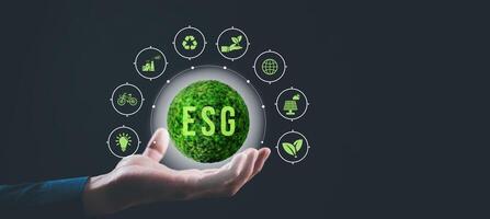 The virtual reality world is in the hands of a businessman, under the sustainable development concept of the organization. photo