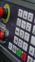 Close-up pressing buttons of machine control panel. Media. Starting production machine using control panel. Panel with button for controlling production machines video