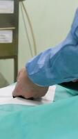 A team of surgeons in operating room during procedure. Creative. Medical technologies, concept of sickness. video
