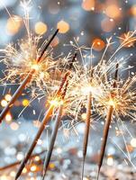 Close-up of festive sparklers with sparkling light trails on a bokeh background, perfect for holiday, celebration, and new year themes. photo