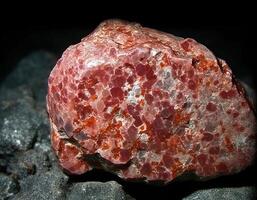 Lepidocrocite is a rare precious natural stone on a black background. . Header banner mockup with space. photo