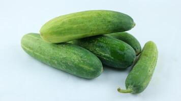 Fresh cucumbers isolated on white background photo