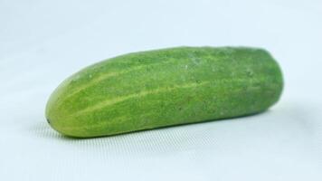 Fresh cucumbers isolated on white background photo