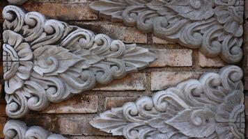 cement carving texture background on garden wall photo