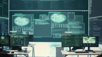 Advanced cyber surveillance room with no personnel present. Governmental agency ensuring national security through cyber security monitoring, data protection and malware detection. Camera B. video