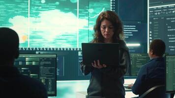 Governmental hackers execute cyber attacks by breaking passwords, compromising online security. Specialists infiltrate digital networks, breaching security protocols. Cyber surveillance. Camera A. video