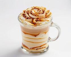 a coffee drink with whipped cream and caramel topping photo