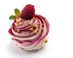 a cupcake with a raspberry on top photo