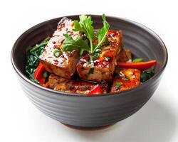 a bowl of tofu with vegetables and herbs photo