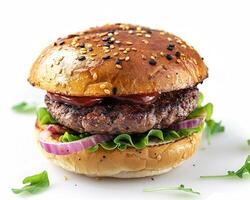 a hamburger with onions and ketchup on a white background photo