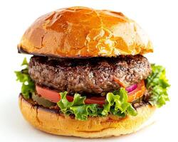 a hamburger with lettuce and tomato on a white background photo