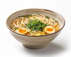 a bowl of ramen with eggs and green onions photo