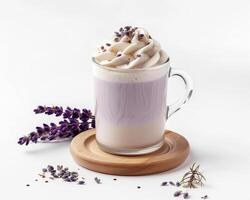 Lavender latte with whipped cream and lavender flowers on white background photo