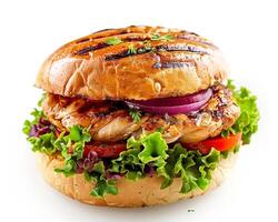 a grilled chicken sandwich with lettuce and onions photo