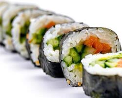 a line of sushi rolls with different types of vegetables photo