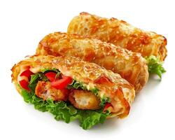 a roll of food with lettuce and vegetables photo