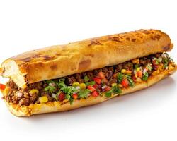 a sandwich with meat and vegetables on a white surface photo