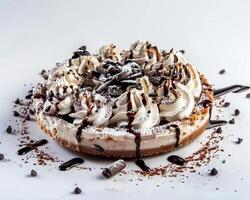 a dessert with chocolate and whipped cream photo