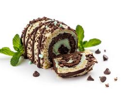a chocolate roll with mint leaves on it photo