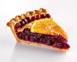 a slice of pie with cranberries and orange slices photo