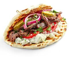 a pita bread with meat and vegetables photo