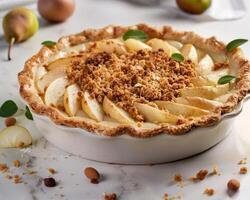 a pie with apples and nuts on top photo