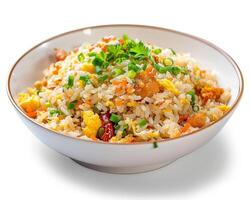 a bowl of fried rice with vegetables and herbs photo