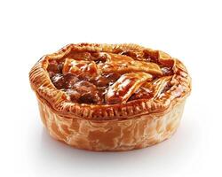a pie with meat and gravy on a white background photo