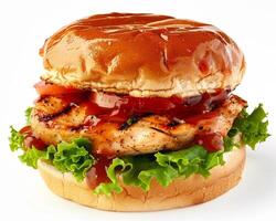 a chicken burger with ketchup and lettuce photo