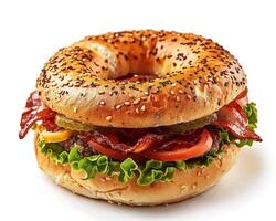 a bagel with bacon, lettuce and tomato photo