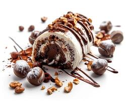 a chocolate roll with nuts and chocolate drizzle photo