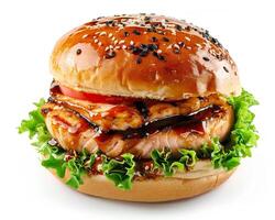 a hamburger with chicken and lettuce on a bun photo