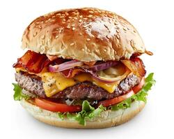 a hamburger with cheese, bacon, lettuce and tomato photo