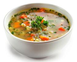 a bowl of soup with carrots and parsley photo