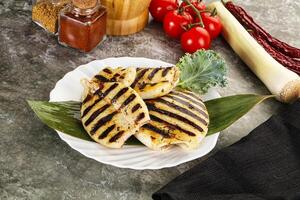 Grilled squid in the plate photo